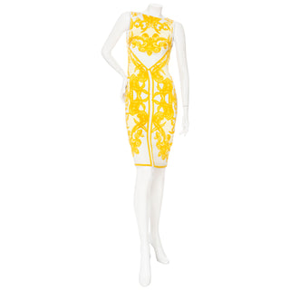 Versace 2005 Yellow Silk Baroque-Print Vintage Dress in Size Medium or estimated US 6-8. Spring 2005 Ready-To-Wear Collection. Features shells and angels. Available at vintage and designer specialty consignment shop Decades in Los Angeles.