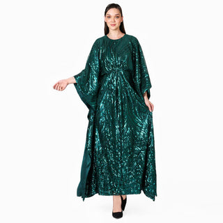 Diahann caftan in teal with sequin embroidery, available in One Size Fits All at vintage and designer specialty shop "Decades," and designed by Cameron Silver.