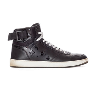 Preowned Men's Louis Vuitton Rivoli Black Leather Monogram High-Top Sneakers in Men's 8.5. Available at vintage and designer specialty consignment shop Decades in Los Angeles.