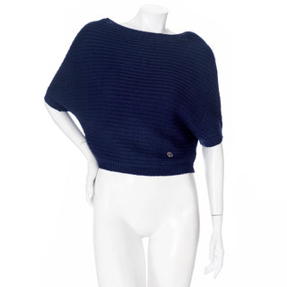 Christian Dior navy blue cashmere short sleeve dolman sweater in Size FR 38, an estimated US Size 6 or Small, available at designer and vintage specialty consignment shop "Decades" in Los Angeles.
