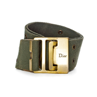 Christian Dior by Galliano vintage army green canvas adjustable belt with brass buckle, available at designer and vintage specialty consignment shop "Decades" in Los Angeles.
