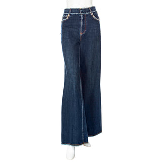 Christian Dior blue fringe-trim denim pants in Size FR 36, an estimated US Size 4 or Small, vailable at designer and vintage specialty consignment shop "Decades" in Los Angeles.