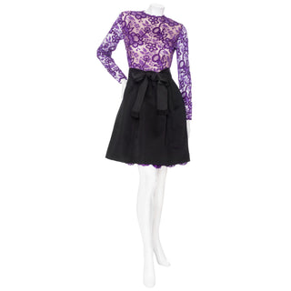 Galanos vintage 1980s black satin and purple lace colorblock cocktail evening dress with optional bow in front or back, in an estimated Small or US Size 4, available at designer and vintage specialty consignment shop "Decades" in Los Angles.