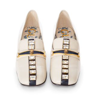Gucci 45mm Ginger Tiger Bit cream leather square-toe loafers adorned with navy stripe front and crystal embellishments in Size 35.5, available at designer and vintage specialty consignment shop "Decades" in Los Angles.
