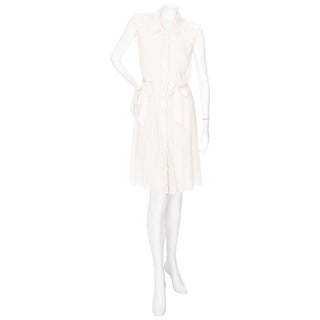 Valentino cream silk lace trim sleeveless dress with bow details in an estimated Small or IT 42, available at designer and vintage specialty consignment shop "Decades" in Los Angles.
