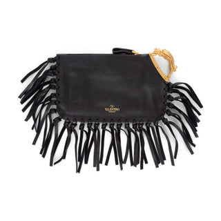 Valentino C-Rockee Sagittarius black leather fringe clutch in excellent preowned condition, available at designer and vintage specialty consignment shop "Decades" in Los Angles.