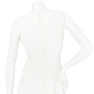 Ivory Rayon-Blend Sleeveless Ruffled Peplum Top