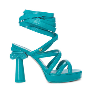 Turquoise green Size FR 36 column heels from 2018 Cruise Collection designed by Karl Lagerfeld at Chanel—these gladiator sandals are available at designer and vintage specialty consignment shop "Decades" in Los Angeles. 