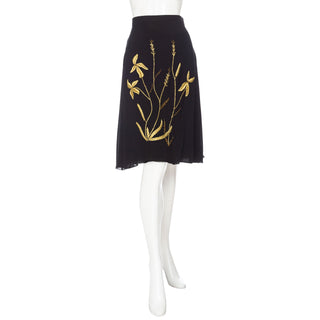 Preowned Dolce & Gabbana skirt from the iconic butterfly runway for Spring 1998, featuring gold embroidered florals. Available in Size IT 38 / US 6 / Small and in great condition with little visible wear. Buy at vintage and designer specialty consignment shop Decades in Los Angeles.