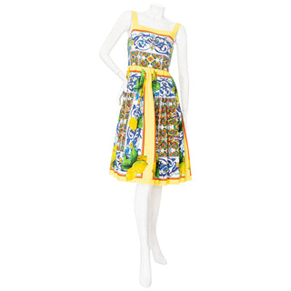 A mutlticolored Sicilian-inspired lemon print A-line dress by Dolce & Gabbana in a Size IT 40 or US Small available at designer and vintage specialty consignment shop "Decades" in Los Angeles.