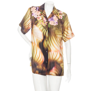 Preowned Dries Van Noten Spring 2022 multicolored silk abstract-print embroidered floral bowling shirt in Size EU 36 / Small, and in great condition, is available online or for purchase at vintage and designer specialty consignment shop Decades in Los Angeles.