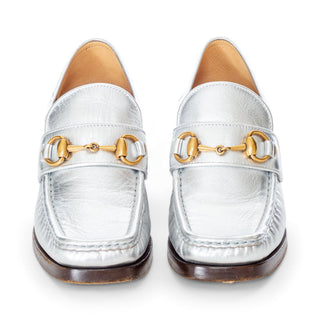 Gucci 55mm Vegas silver leather square-toe loafers with gold-tone hardware in Size 35.5, available at designer and vintage specialty consignment shop "Decades" in Los Angles.