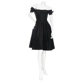 Resale vintage black A-line cocktail dress by Hattie Carnegie in estimated Size Small. Available for purchase online and in store at Decades Los Angeles.
