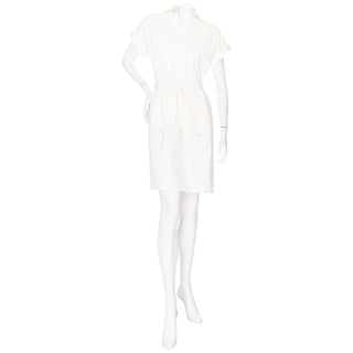 Hermès white stretch cotton short sleeve collared sheath dress with front tie, in Size FR 34, an estimated US Size 2 or Extra Small, available at designer and vintage specialty consignment shop "Decades" in Los Angles.